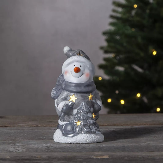 LED dekoracija „Besmegenis su eglute“ – 15x9 cm